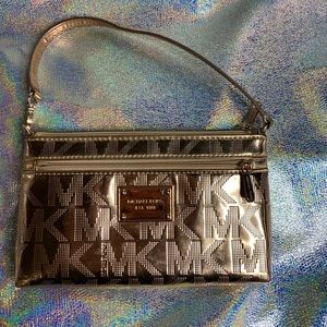 Michael Kors rose gold mirrored wristlet
